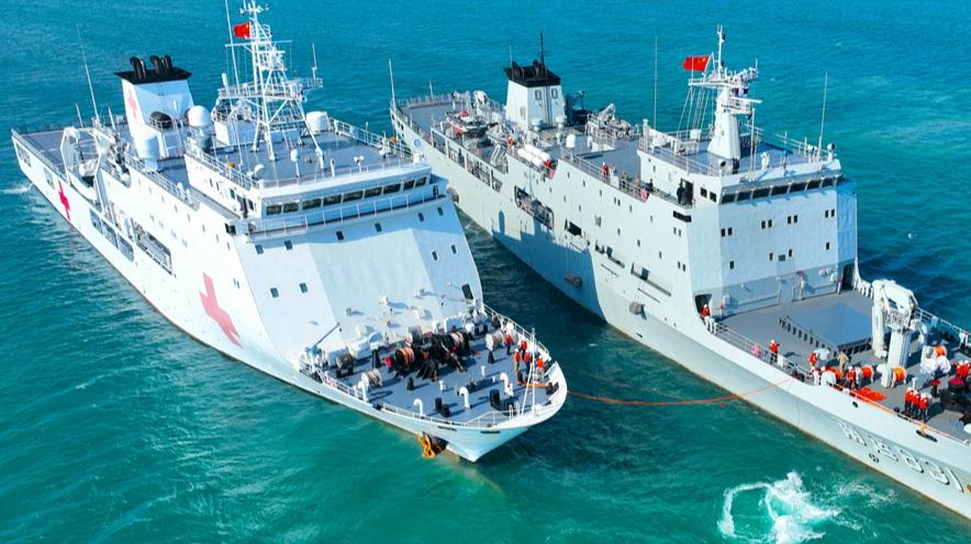 Naval vessels in replenishment-at-sea training