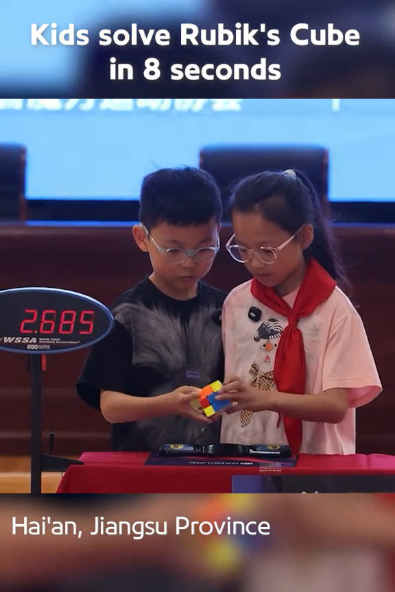 Kids solve Rubik's Cube in 8 seconds