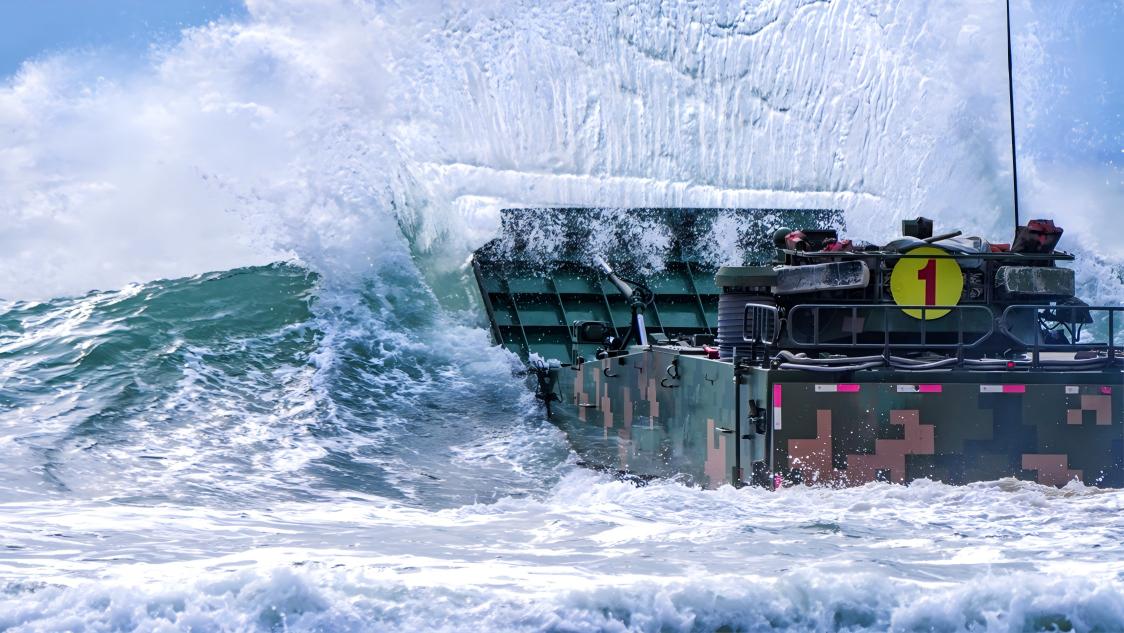 Amphibious armored vehicles conduct combat training