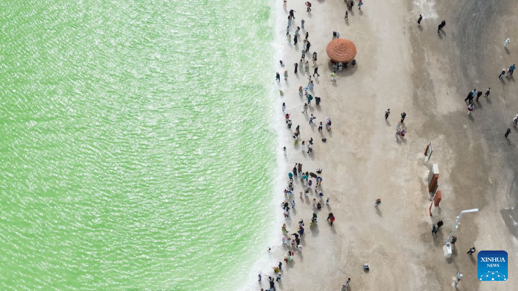 Tourists visit Qairhan salt lake in China's Qinghai