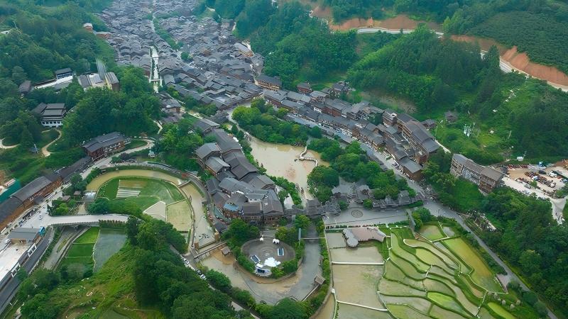 Intangible cultural heritage breathes new life into Dong village in SW China's Guizhou