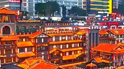 Golden lights illuminate Hongyadong's stilted houses