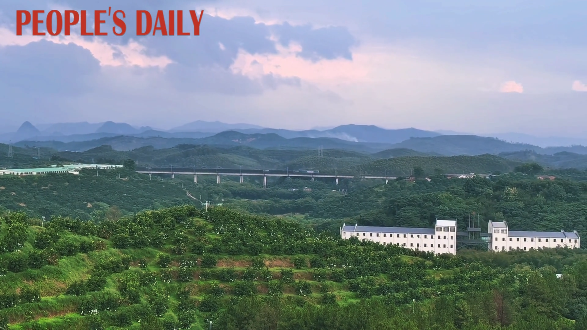 Train winds through idyllic scenery in Shaoguan, Guangdong