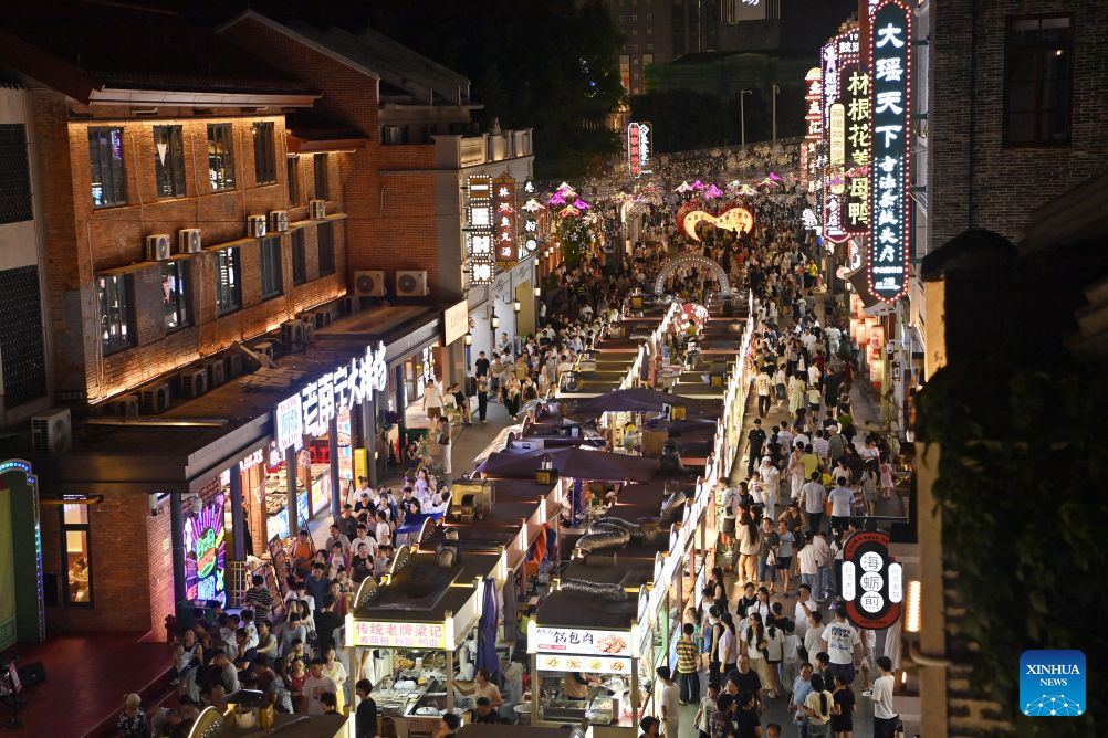 Night markets bustling with visitors during summer peak tourism season in China's Nanning