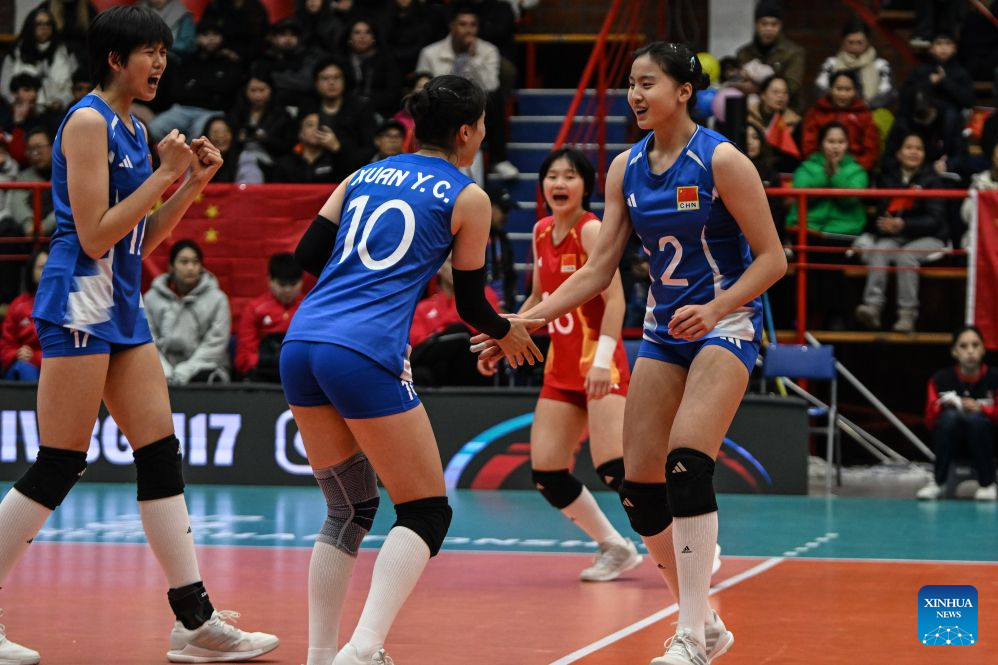 Xu Ruilin (R) of China celebrates scoring with her teammates Xuan Yachen (C) and Niu Sidi during the Pool B Preliminary Phase match between China and Mexico at the FIVB Volleyball Girls' U17 World Championship in San Felipe, Chile, Aug. 10, 2026. (Photo by Jorge Villegas/Xinhua)