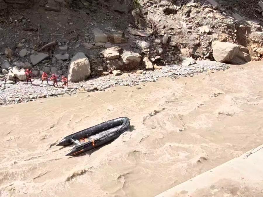 This screenshot from a video clip taken on Aug. 28, 2026 shows rescue operations underway at the mudslide-hit area. (Xinhua)