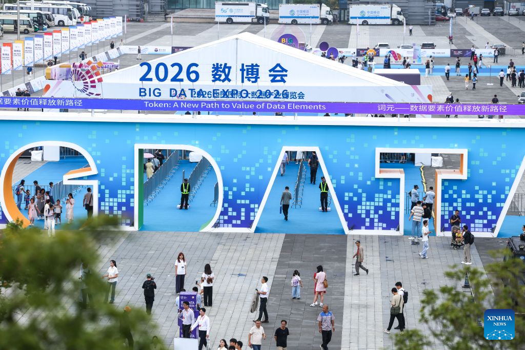 People enter the venue for the 2026 China International Big Data Industry Expo in Guiyang, southwest China's Guizhou Province, Aug. 28, 2026. The 2026 China International Big Data Industry Expo opened on Friday.  Themed "Token: A New Path to Value of Data Elements," the expo has attracted 372 domestic and international companies and over 16,000 registered guests. (Xinhua/Yang Wenbin)