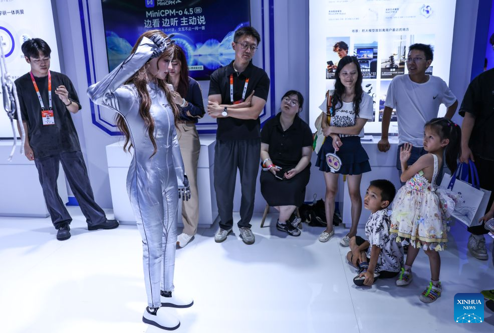 People view a humanoid robot during the professional exhibition of the 2026 China International Big Data Industry Expo in Guiyang, southwest China's Guizhou Province, Aug. 28, 2026. Themed "Token: A New Path to Value of Data Elements," the expo spotlights cutting-edge innovations integrating data with artificial intelligence. (Xinhua/Yang Wenbin)