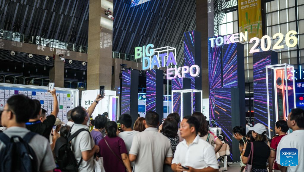 People visit the 2026 China International Big Data Industry Expo in Guiyang, southwest China's Guizhou Province, Aug. 28, 2026. The 2026 China International Big Data Industry Expo opened on Friday.  Themed "Token: A New Path to Value of Data Elements," the expo has attracted 372 domestic and international companies and over 16,000 registered guests. (Xinhua/Tao Liang)