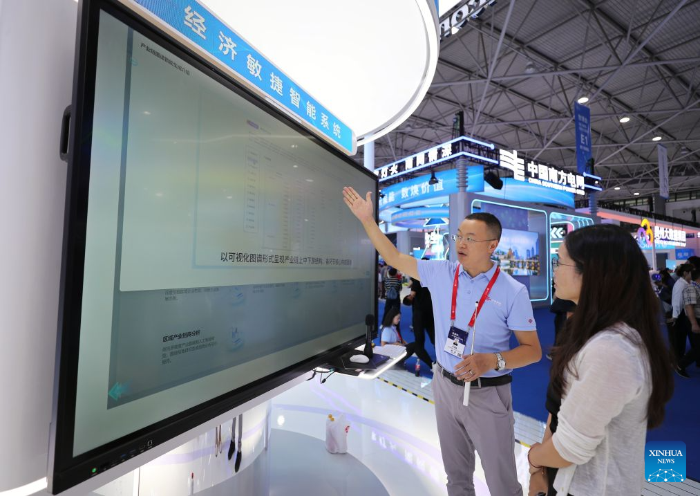 A visitor learns about an intelligent system during the professional exhibition of the 2026 China International Big Data Industry Expo in Guiyang, southwest China's Guizhou Province, Aug. 28, 2026. Themed "Token: A New Path to Value of Data Elements," the expo spotlights cutting-edge innovations integrating data with artificial intelligence. (Xinhua/Li Xulun)