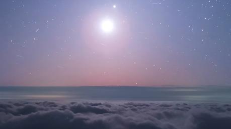 Jupiter and moon shine above sea of clouds at Mount Fanjing