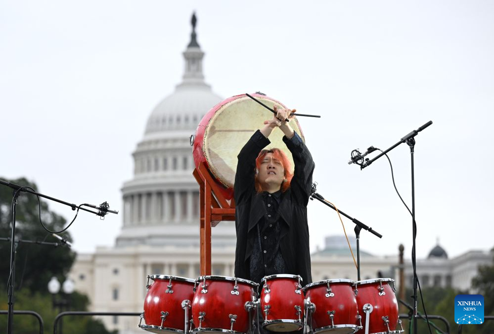 Chinese percussionist Li Zhuowen performs the Dao of Drums during "Future Resonance -- ShanghaiEye Night" in Washington, D.C., the United States, on Oct. 3, 2026. The Shanghai-themed cultural exchange event was held here on Saturday, bringing a taste of Shanghai to the United States. The event was also part of the "Shanghai Let's Meet" city promotion initiative and a broader series of China-U.S. people-to-people exchanges. (Xinhua/Li Rui)