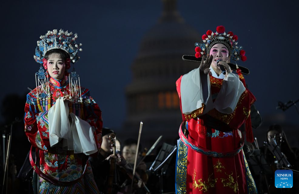 Chinese Huangmei Opera artists Han Zaifen (R) and Chen Bangliang perform Huangmei Opera: The Lady Consort Prince during "Future Resonance -- ShanghaiEye Night" in Washington, D.C., the United States, on Oct. 3, 2026. The Shanghai-themed cultural exchange event was held here on Saturday, bringing a taste of Shanghai to the United States. The event was also part of the "Shanghai Let's Meet" city promotion initiative and a broader series of China-U.S. people-to-people exchanges. (Xinhua/Li Rui)