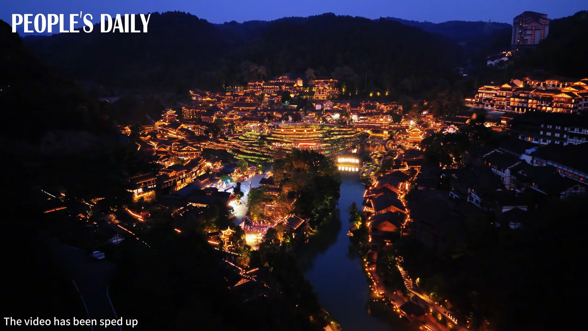 Night lights up Wujiangzhai scenic spot in Guizhou