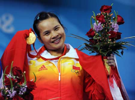 Chinese weightlifters meet press