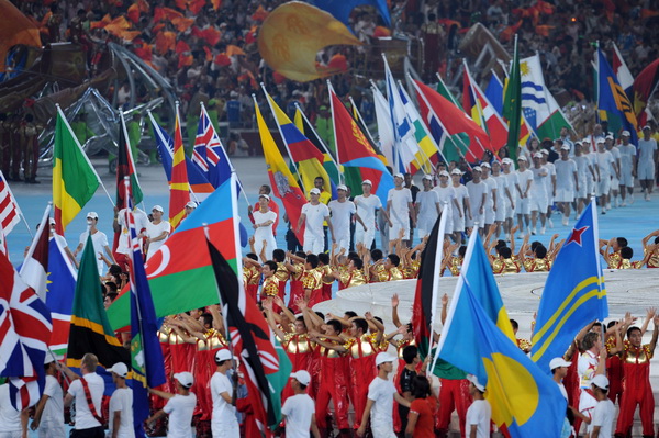 Athletes enter the closing ceremony of the 29th Olympic Games