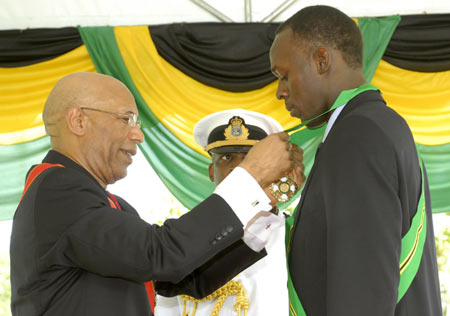 Bolt receives top Jamaican civic award