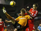 Liverpool wins over 10-man Wolves