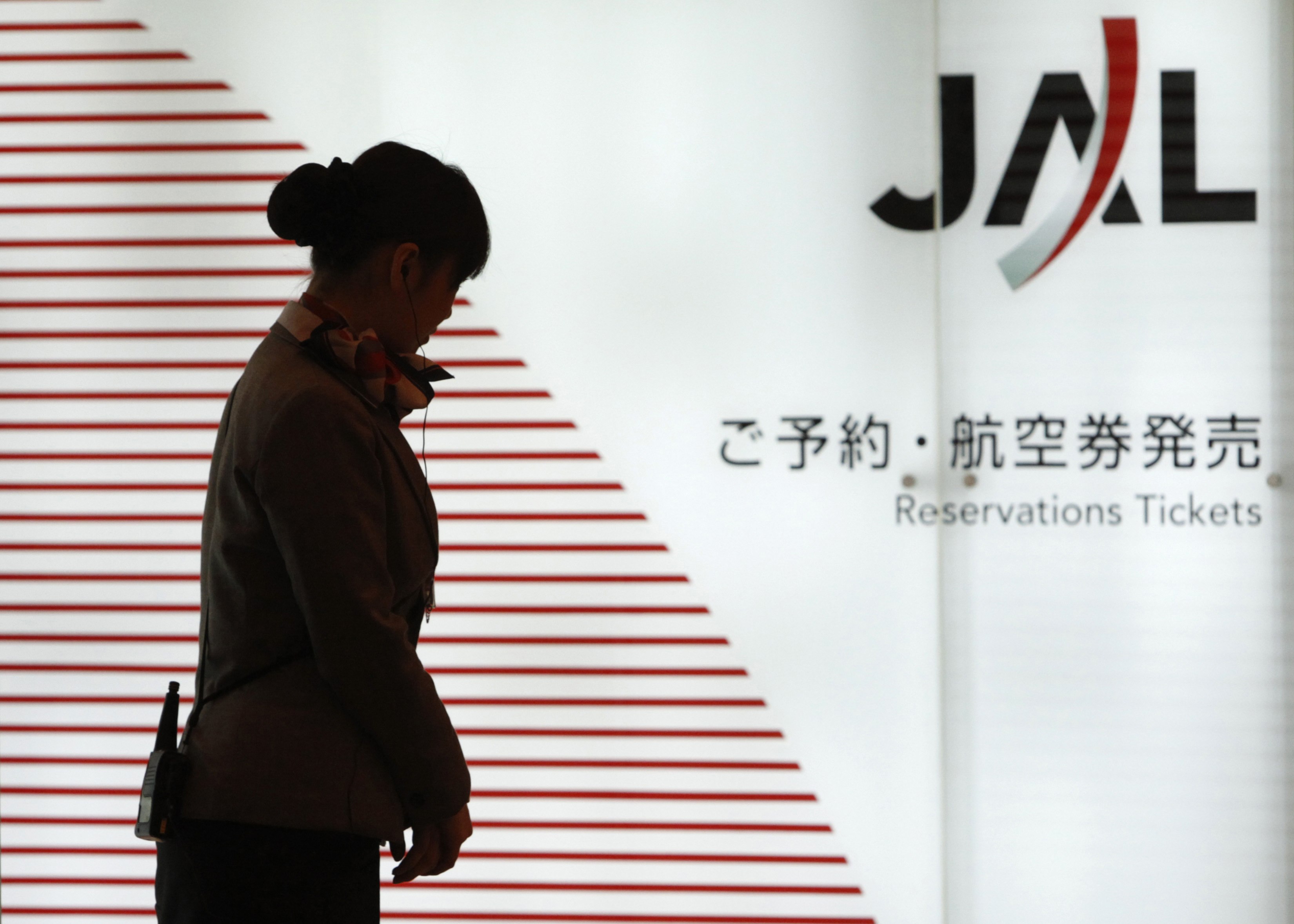 Japan Airlines files for bankruptcy protection, to be delisted next month