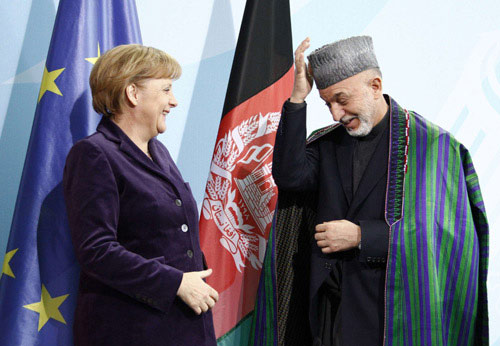 Germany hopes to reduce security duties in Afghanistan by 2014 as aid continues