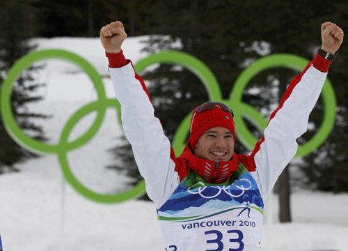 Swiss Cologna wins men's 15km cross-country skiing Olympic gold 