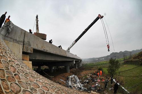 Seven dead after bus crashes off bridge in central China