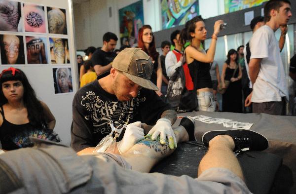 Visitors enjoys Uruguay Tattoo Expo