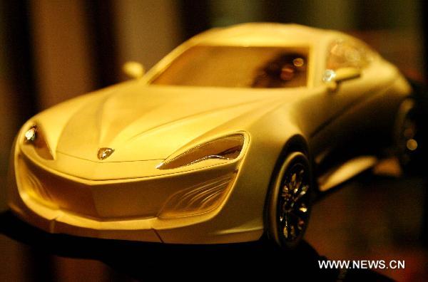 Gold sports car model worth 3 mln yuan