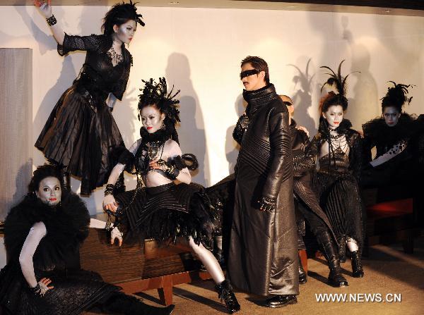 Avant-garde costumes for musical "The Lady of the Camellias"
