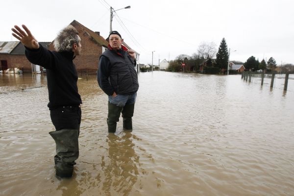 Rivers burst banks in Belgium, flooding towns and villages