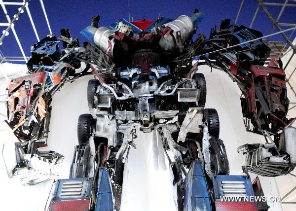 Giant transformer assembled from wasted automobiles