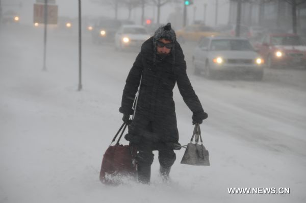 Blizzard hits Chicago area, over 1,300 flights canceled