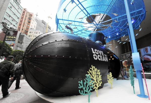 Submarine model placed at Times Square in HK for ocean protection