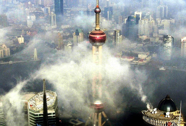Fog clouds Shanghai's skyscrapers