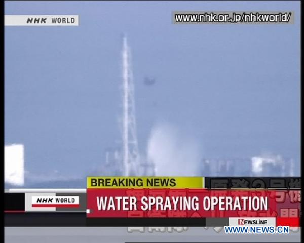 Japan SDF helicopters dump water on two stricken nuclear reactors 