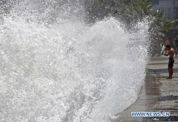 Rough sea waves hit Brazil's coast