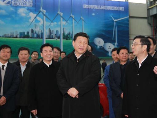 Chinese Vice President Xi Jinping (2nd R front), also a member of the Standing Committee of the Political Bureau of the Communist Party of China (CPC) Central Committee, inspects the Xiangtan Electric Manufacturing Co., Ltd. in Xiangtan, central China's Hunan Province, March 21, 2011. Xi Jinping made an inspection tour in Hunan from March 20 to 23. (Xinhua/Ju Peng)