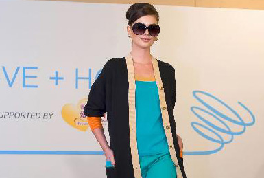 Graceful Hepburn-style sweeps 'Love Plus Hope' fashion show in HK