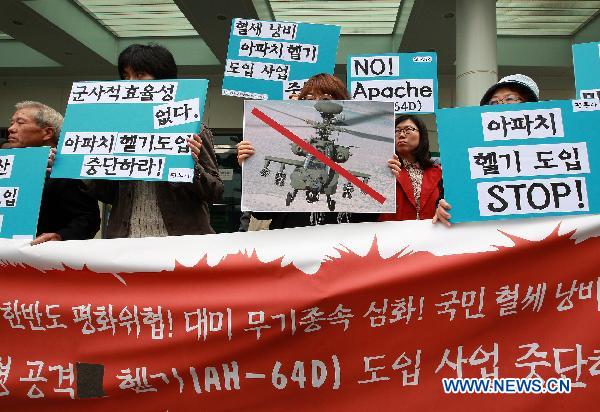 S Korean protesters rally against import of Apache helicopters