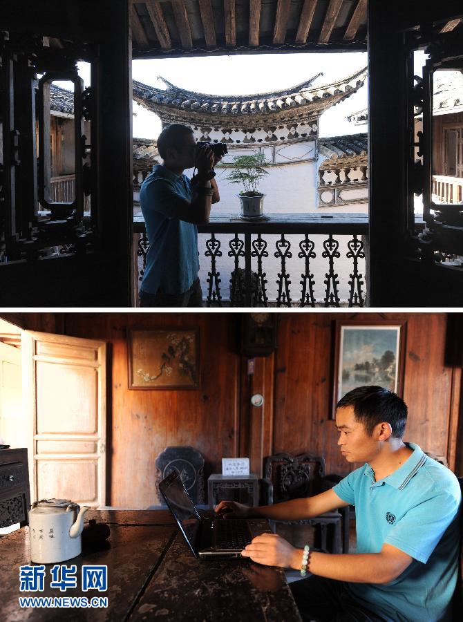Yin Cangding, a young man in Yunnan province who rebuilt his 200-year-old house in to a folkloric hotel, promotes it through online forums, blogs and microblogs which attract numerous visitors. (Photo/ Xinhua)