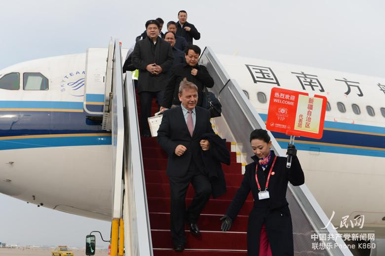 Delegates to the 18th National Congress of the Communist Party of China (CPC) from northwest China's Xinjiang Uygur Autonomous Region arrive in Beijing, capital of China, on Nov. 5, 2012. The 18th CPC National Congress will be opened in Beijing on Thursday. (People's Daily Online/Lei Sheng) 