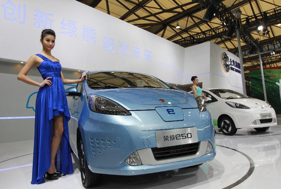 A Roewe E50 electric car is displayed at the 14th China International Industry Fair in east China's Shanghai Municipality, Nov. 6, 2012. The industry fair opened to the public Tuesday at Shanghai New International Expo Center, with 1,648 exhibitors from at home and abroad. (Xinhua/Pei Xin)