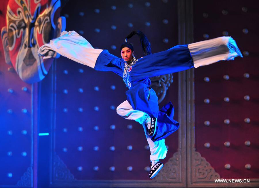 An actor performs an aria of Shaanxi opera at the Gansu Theater in Lanzhou, capital of northwest China's Gansu Province, Nov. 6, 2012. A performance was held here Tuesday night to celebrate the opening of an eight-day Shaanxi opera art festival. Shaanxi Opera, commonly known as Qinqiang, is the oldest of all the Chinese operas that are still in existence today. (Xinhua/Liang Qiang) 