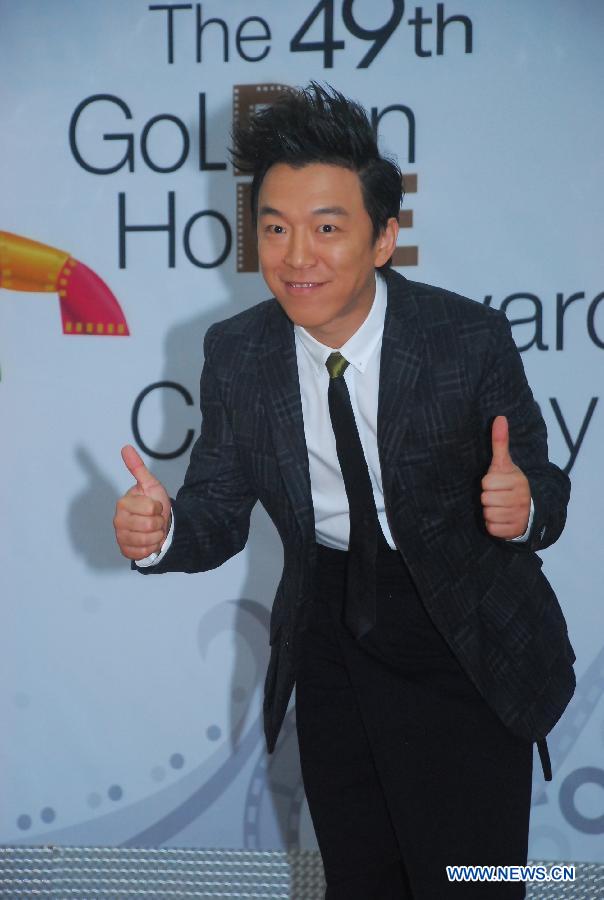 Huang Bo, a host of the 49th Golden Horse Awards ceremony, poses for photos at a press conference in Taipei, southeast China's Taiwan, Nov. 7, 2012. (Xinhua)