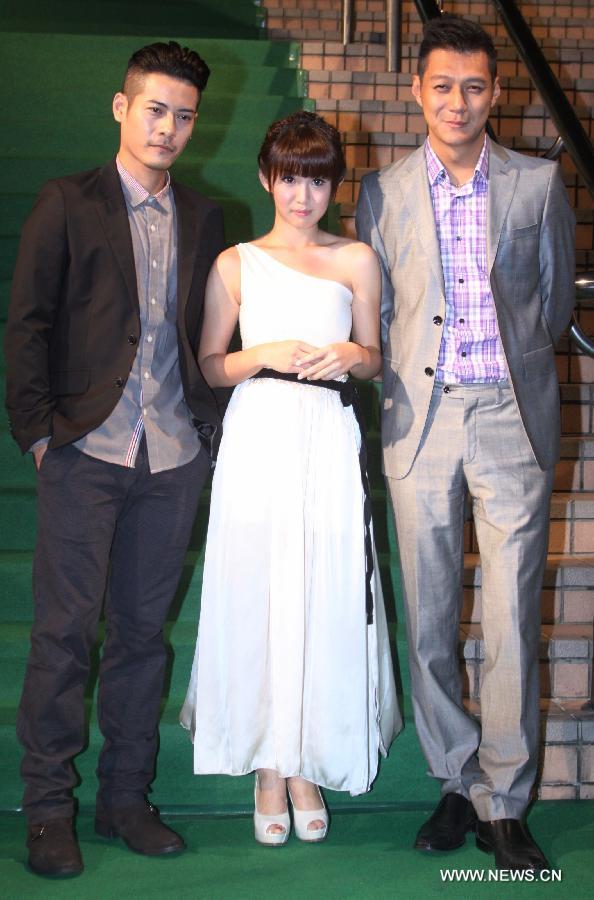 Actors Ting Wei Lu (L), Sawyer Kuak (C) and Dennis Nieh pose at the premiere of director Chi-Jan Hou's new film "When a Wolf falls in love with a Sheep" in Taipei, southeast China's Taiwan, Nov. 6, 2012. (Xinhua)