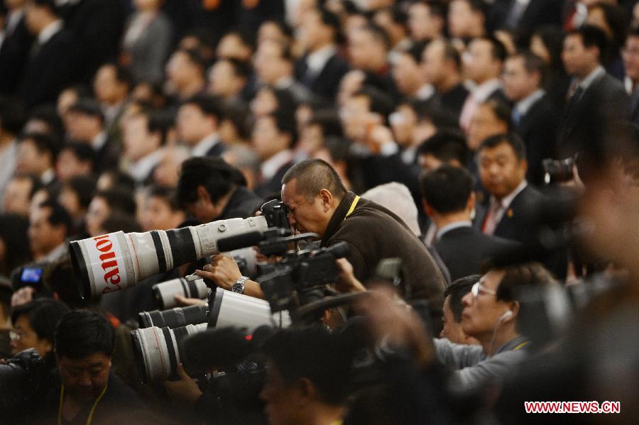 Photographers take photos of the opening ceremony of the 18th National Congress of the Communist Party of China (CPC) at the Great Hall of the People in Beijing, capital of China, Nov. 8, 2012. The 18th CPC National Congress opened in Beijing on Thursday, which also marks the 12th Journalists' Day of China. A total of 2,732 Chinese and foreign journalists are involved in the coverage of the 18th CPC National Congress. (Xinhua/Wang Jianhua)