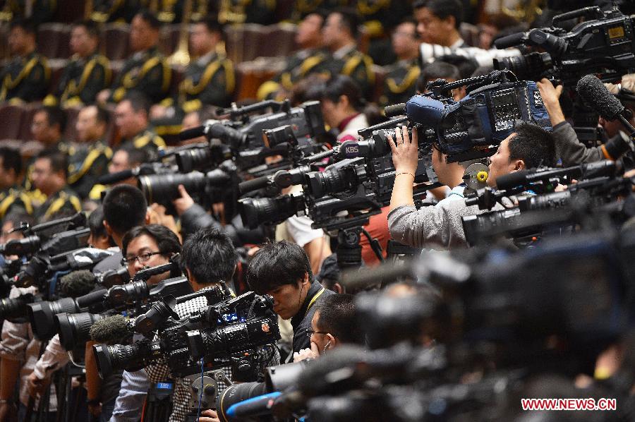 Video journalists cover the opening ceremony of the 18th National Congress of the Communist Party of China (CPC) at the Great Hall of the People in Beijing, capital of China, Nov. 8, 2012. The 18th CPC National Congress opened in Beijing on Thursday, which also marks the 12th Journalists' Day of China. A total of 2,732 Chinese and foreign journalists are involved in the coverage of the 18th CPC National Congress. (Xinhua/Li Xin)