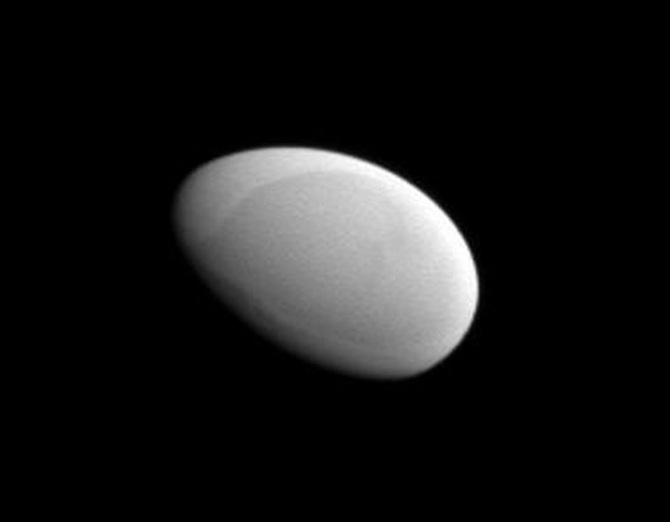 Methone: Smooth Egg Moon of Saturn. Why is this moon shaped like a smooth egg? The robotic Cassini spacecraft completed the first flyby ever of Saturn's small moon Methone in May and discovered that the moon has no obvious craters. Craters, usually caused by impacts, have been seen on every moon, asteroid, and comet nucleus ever imaged in detail -- until now. (Photo/ NASA)