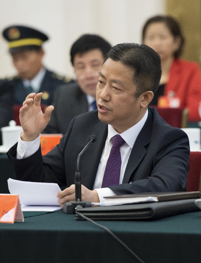 Zhou Haijiang, a member of the Jiangsu delegation of the 18th National Congress of the Communist Party of China (CPC), speaks at the delegation's panel discussion in Beijing, capital of China, Nov. 9, 2012. (Xinhua/Wang Ye)