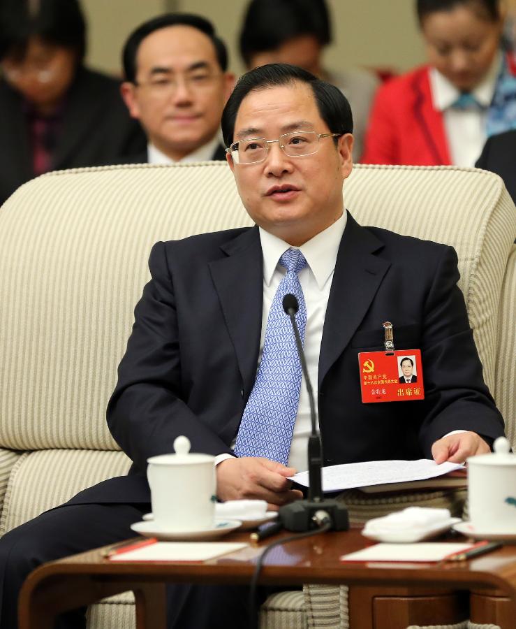 Jin Zhuanglong, a member of the Shanghai delegation of the 18th National Congress of the Communist Party of China (CPC), speaks at the delegation's panel discussion in Beijing, capital of China, Nov. 10, 2012. (Xinhua/Lan Hongguang)